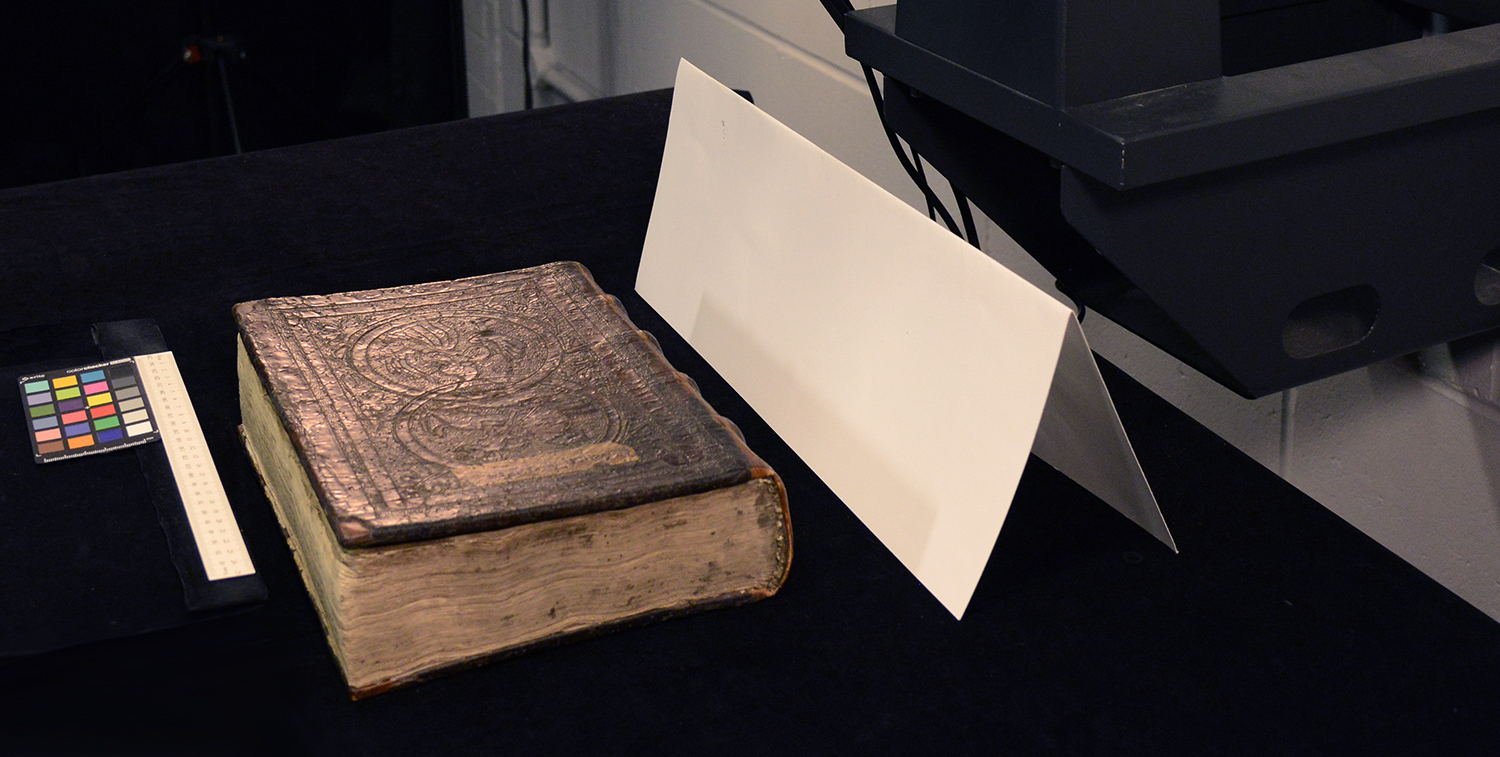 A Hamilton manuscript's upper board being photographed from above